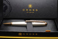 Cross pen in a black box with gold accents