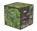 Wooden box with a floral design on a cutting mat