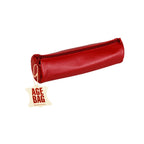Red leather clutch bag with 'AGE BAG' tag on a white background