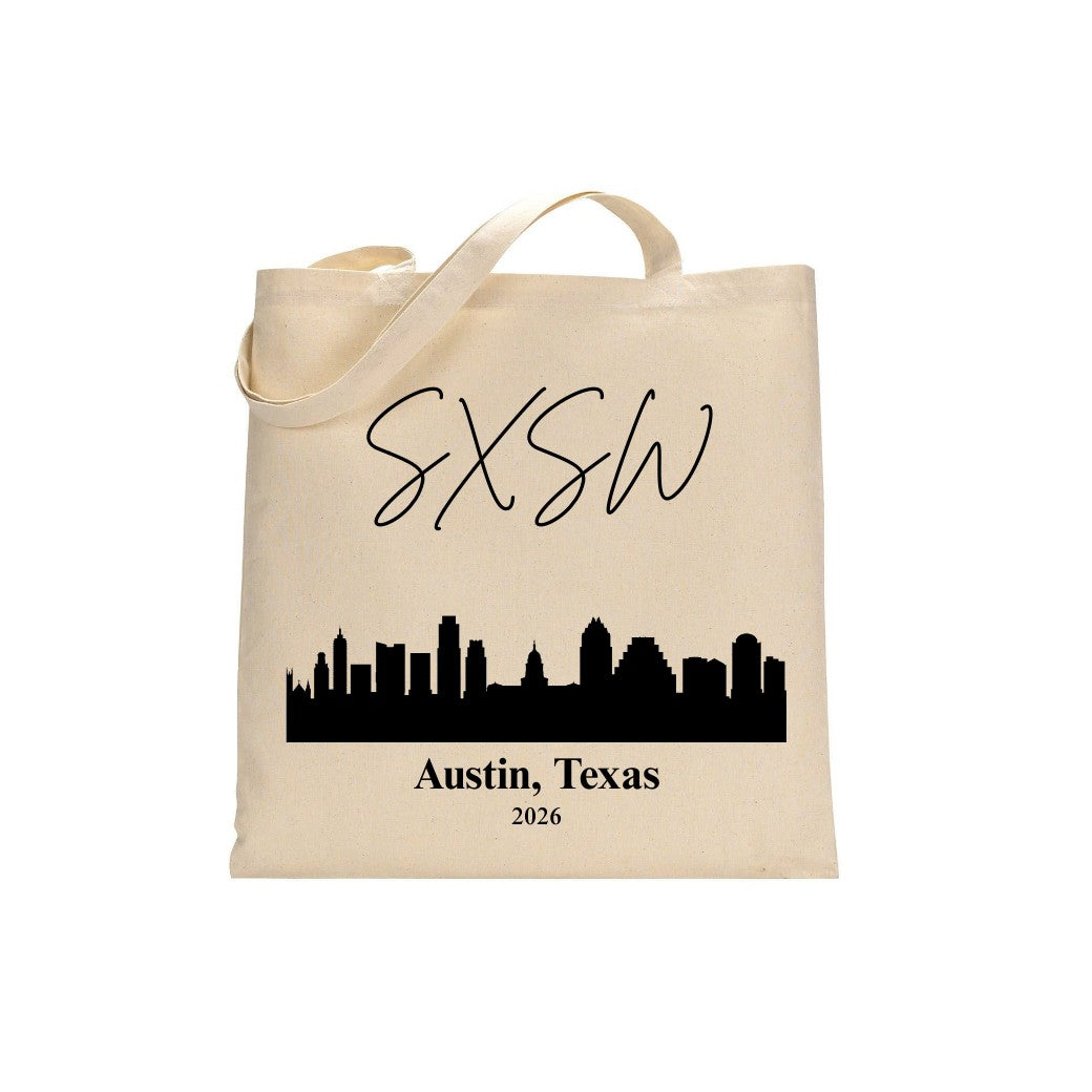 Beige tote bag with black 'SXSW' and 'Austin, Texas 2026' text on a white background
