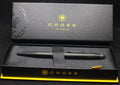 Black pen in a Cross branded box on a black background