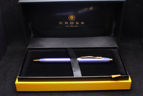 Pen in a Cross branded box on a black background